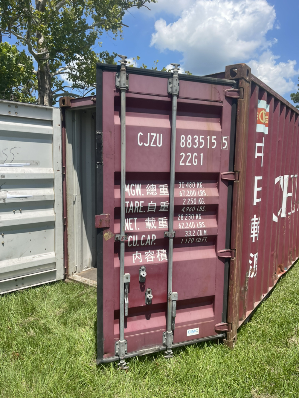 Storage container with open door after delivery